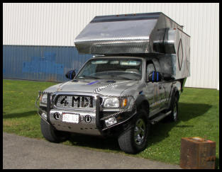 Truck camper cap front